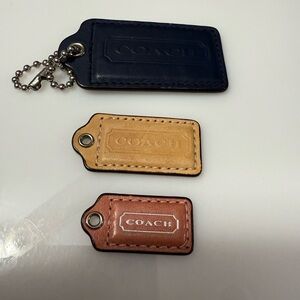 Coach Trio Leather Keychain Set in Black, Tan, and Pink